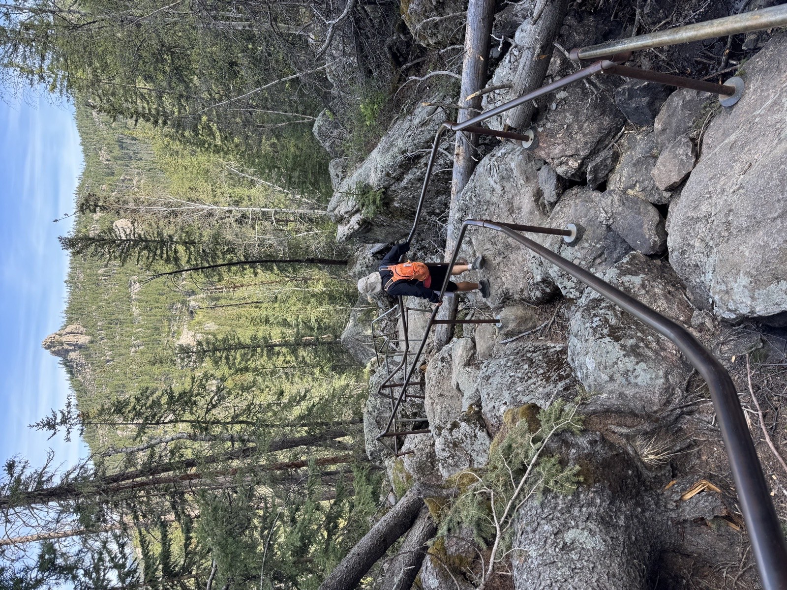 Metal handrails on a steep section of the Sunday Gulch Trail in the Black Hills